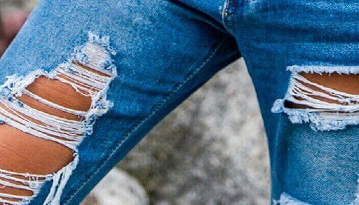 Damskie jeansy z dziurami
