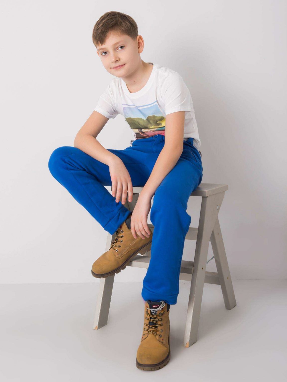 Niebieskie spodnie dresowe dla chłopca DODO KIDS