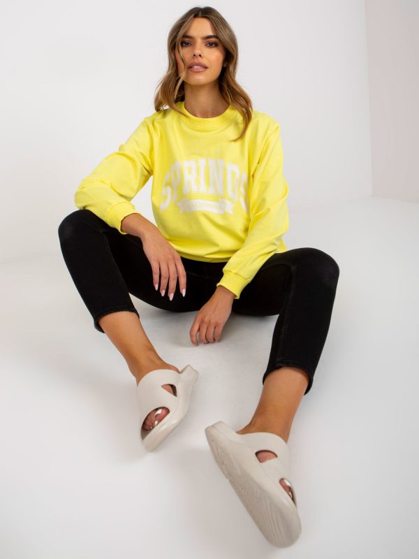 Yellow and white women's oversize sweatshirt with lettering