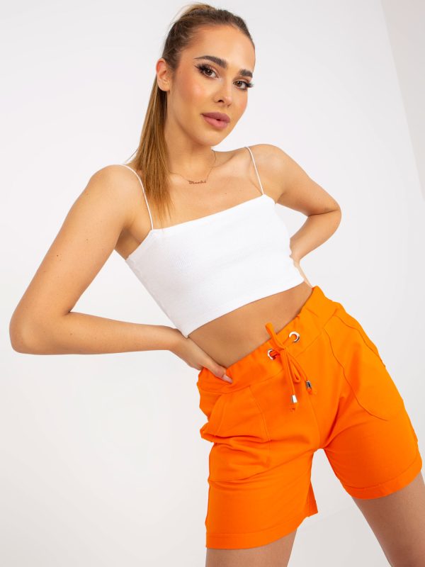 Online rõivaste hulgimüüja Oranžid kõrge vöökohaga dressipüksid