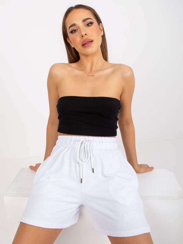 Online rõivaste hulgimüüja RUE PARIS valged kõrge vöökohaga dressipüksid