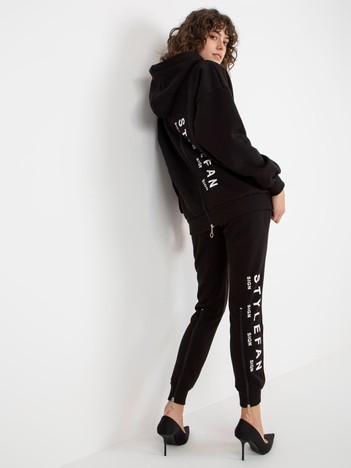 Black women's sweatsuit set with zippers and inscriptions