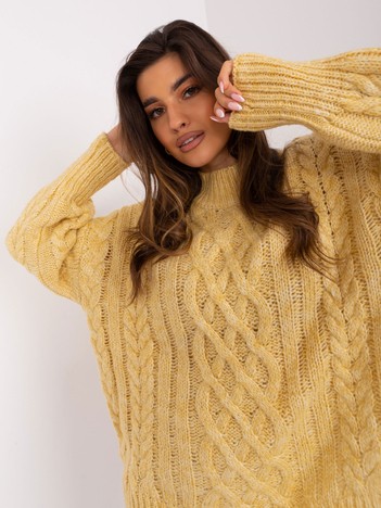 Light yellow sweater with braid