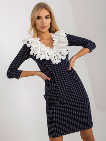 Navy blue and white cocktail dress with decorative neckline