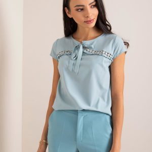 Nadine's light blue blouse