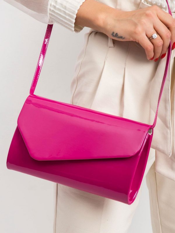 Fuchsia lacquered clutch bag