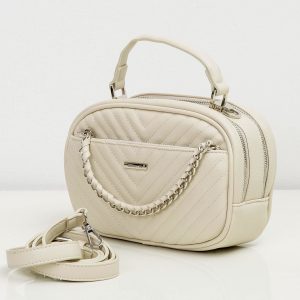 Cream handbag with decorative chain