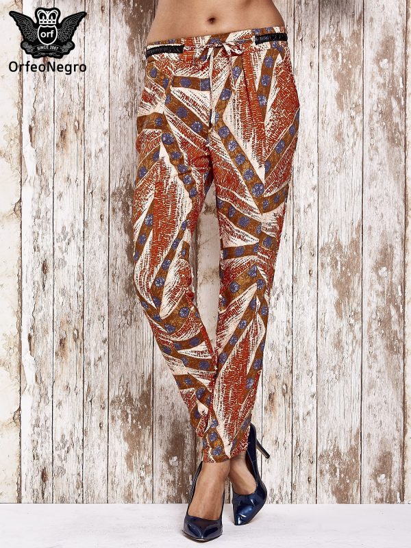 Orange flowing trousers with artistic print