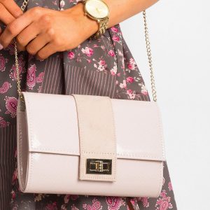 Light pink clutch bag on a chain