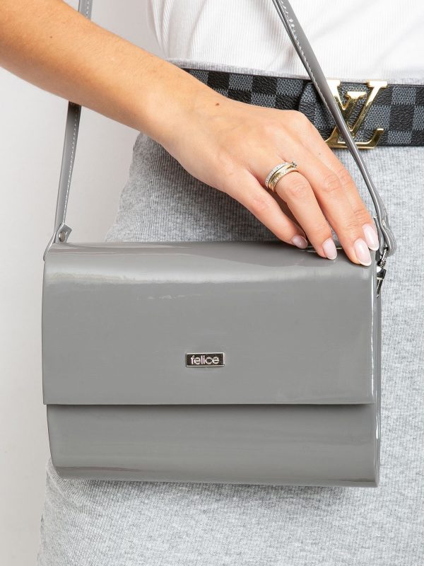 Grey lacquered clutch bag