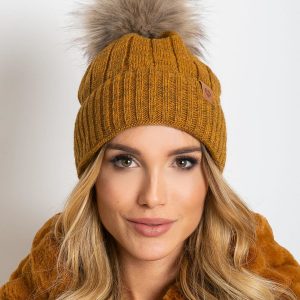 Dark yellow winter hat with tassel