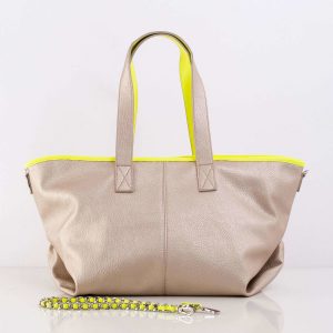 Gold bag with decorative strap