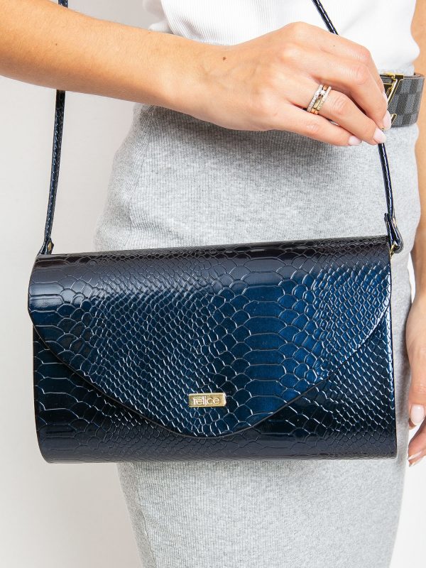 Navy blue clutch bag with snake skin motif