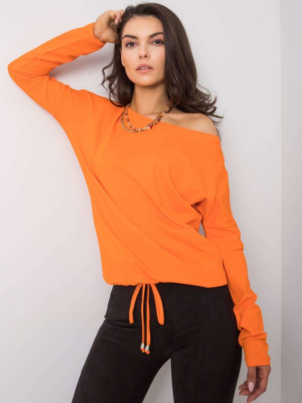 Carla's orange blouse