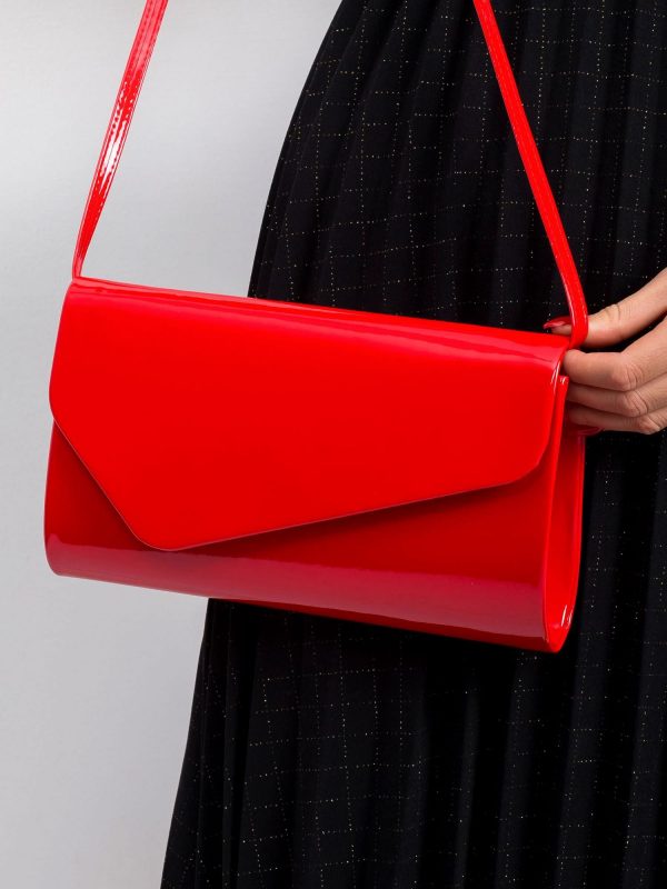 Red lacquered clutch bag