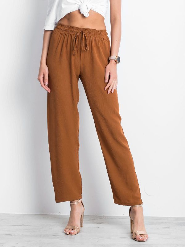 Brown pants Inability