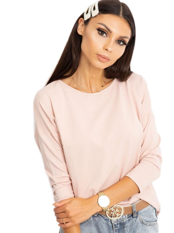 April's light pink blouse