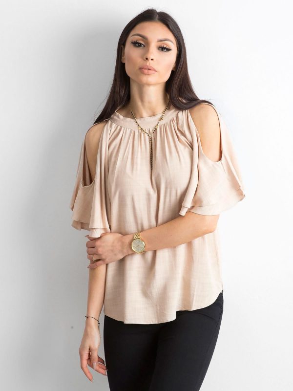 Light beige blouse with cutouts on the shoulders