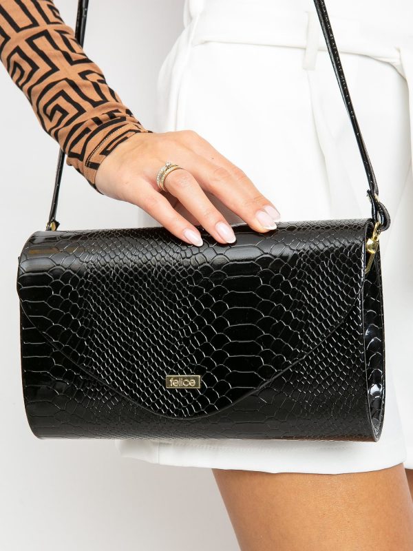 Black clutch bag with snake skin motif