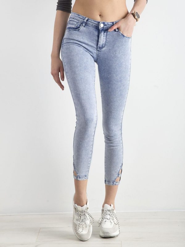 Light blue skinny jeans with cutouts