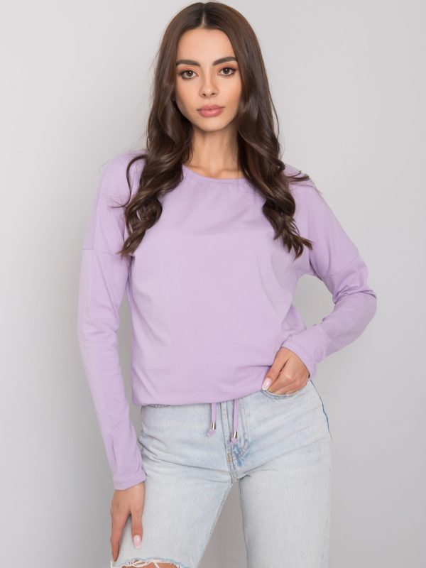 Carla's light purple blouse