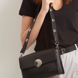 Black handbag with decorative clasp