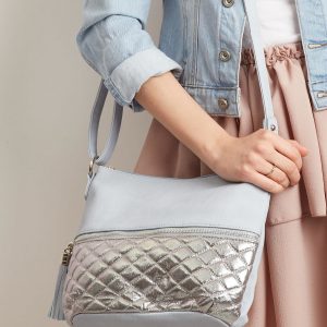 Light blue handbag with shiny quilted insert