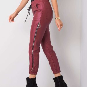 Jackie's maroon waxed pants