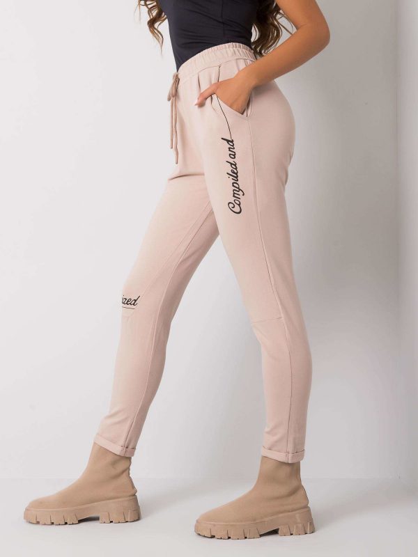 Beige sweatpants with Haylee inscriptions