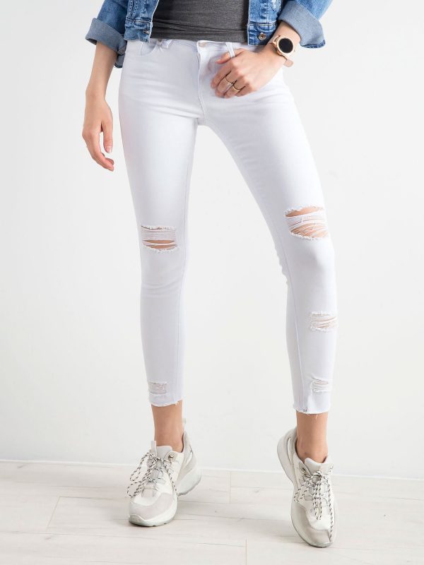 White skinny jeans with holes