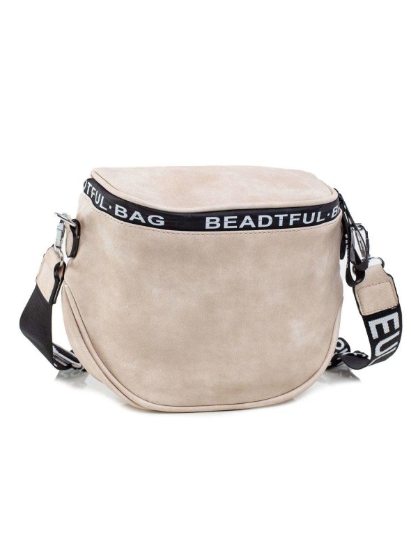 Beige women's handbag with detachable strap