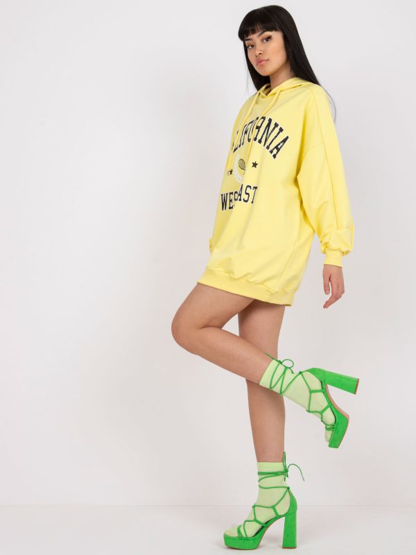 Yellow sweatshirt with print and stripes