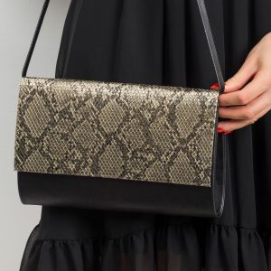 Black and gold clutch bag with snake motif