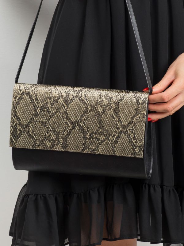 Black and gold clutch bag with snake motif