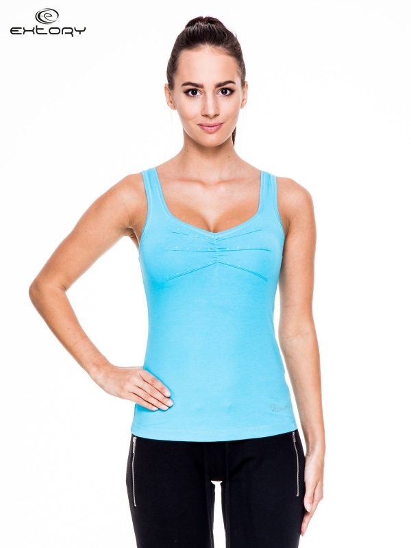 Blue women's sports top with rhinestones