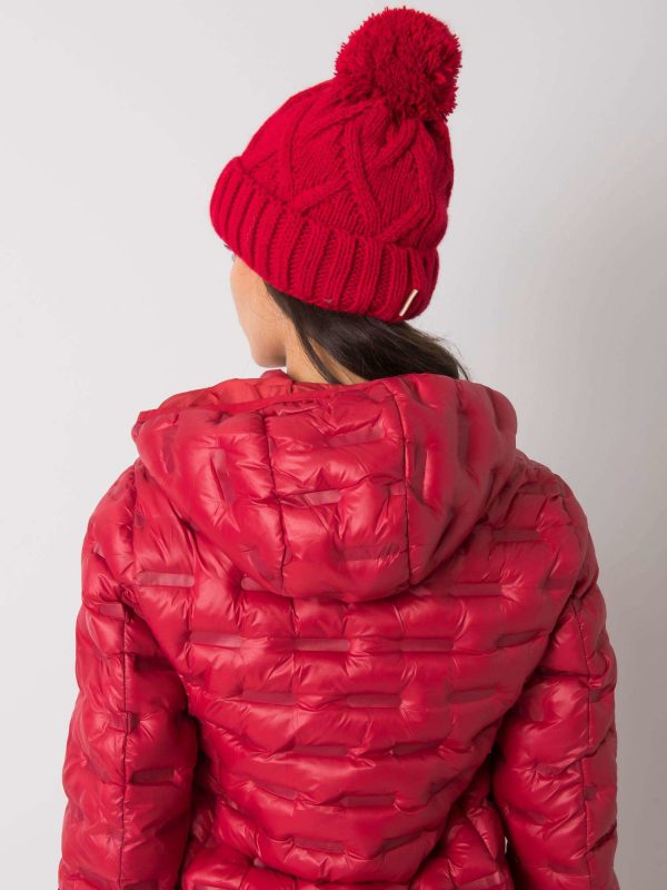 Red winter hat with pompom