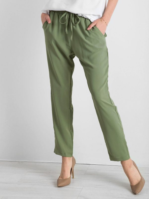 Green trousers with stripes