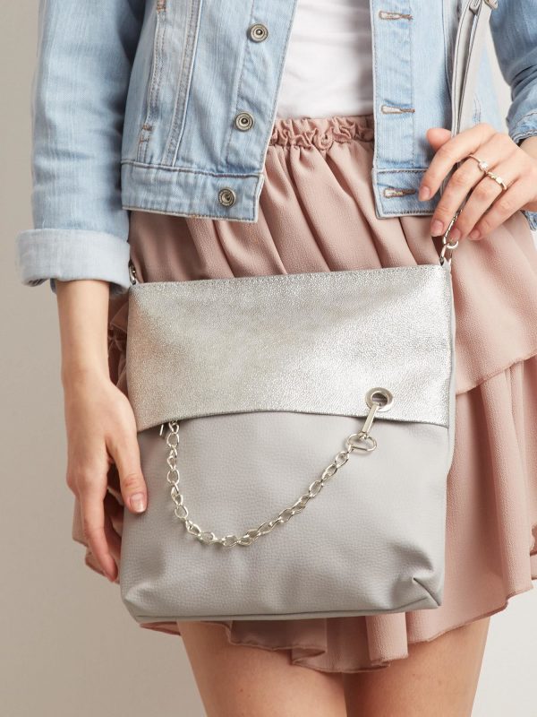 Light grey handbag with silver module