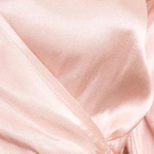 Light pink blouse with BSL binding