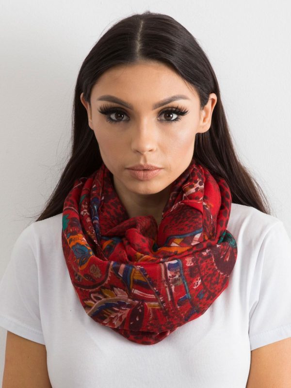 Dark red airy wrap with folk patterns