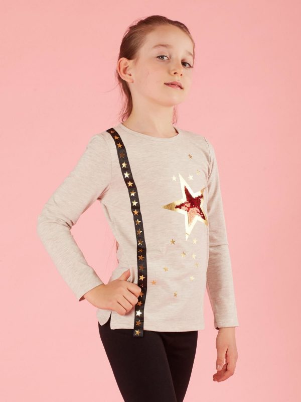 Beige children's blouse with applique