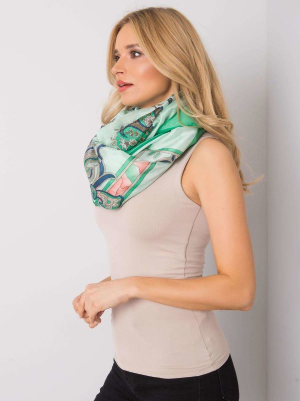 Green scarf with colorful patterns