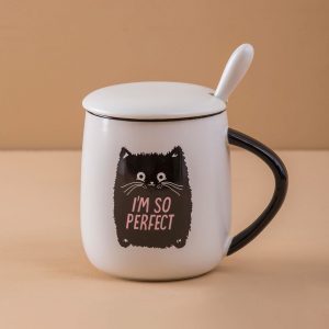 White and black mug with print