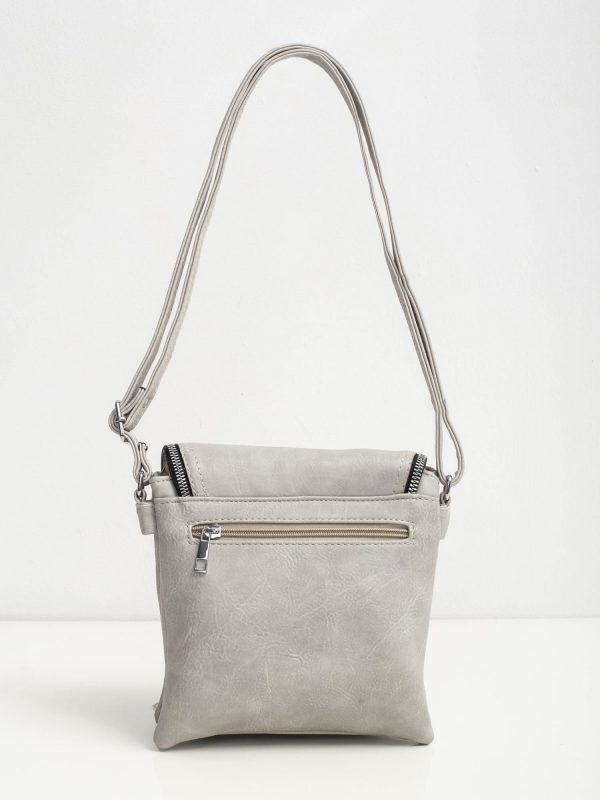 Grey handbag with tasses