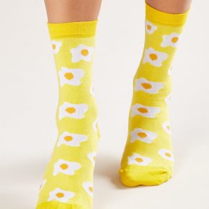 Yellow socks with egg print