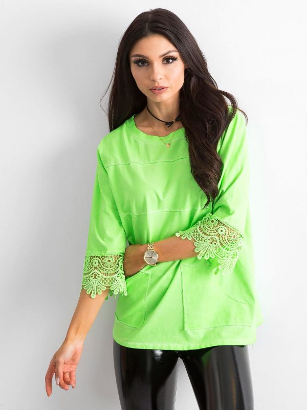 Fluo green blouse with lace and pockets