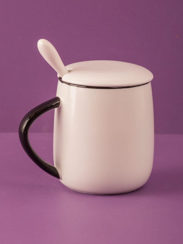 White mug with lid and cat