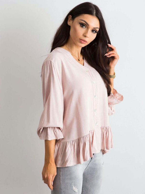 Light pink loose blouse with flounce