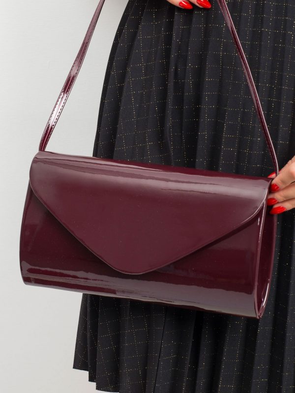 Burgundy lacquered clutch bag