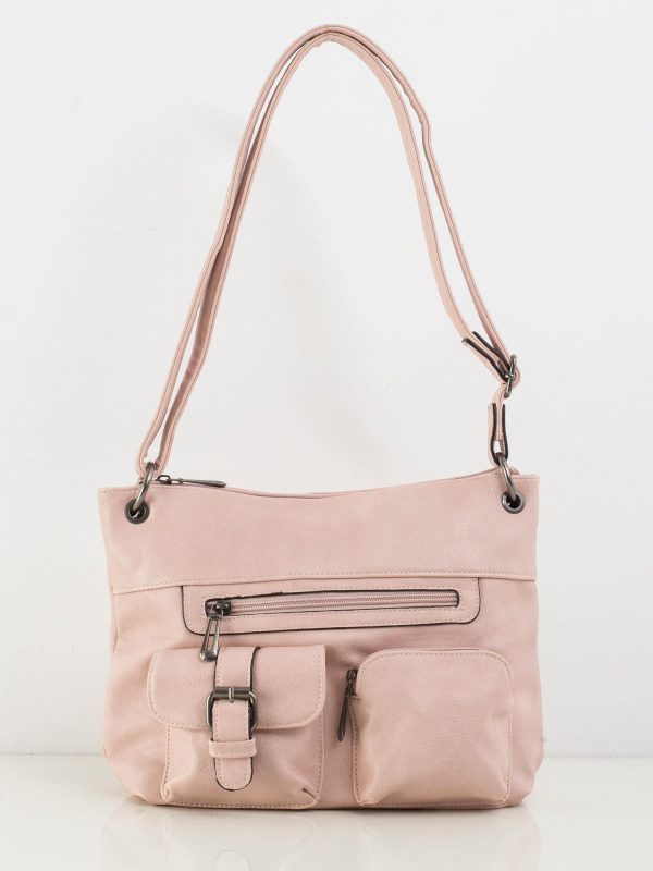 Pale pink handbag on long strap